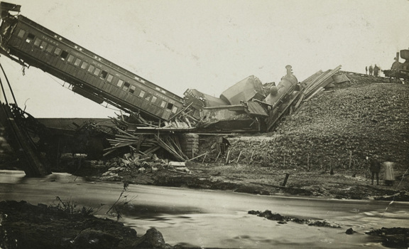 Train wreckage following a bridge failure at McCallums Creek, 19 August 1909