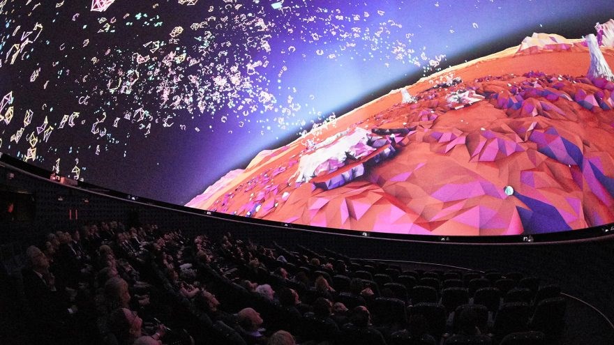 Audience watching a projection in fulldome format