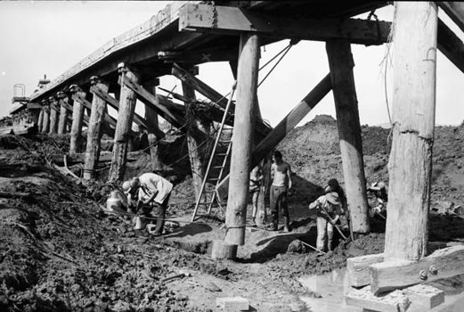 View of Bairnsdale to Orbost line bridge after Snowy River floods, 15 February 1971