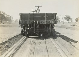 Construction of the Yarrawonga to Oaklands line, Yarrawonga, circa 1930. Ballast has been spread between the tracks by the plough while excess ballast has been deposited on the outside of the tracks.