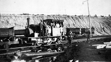 A family group posing for a photograph on a locomotive, Gippsland, circa 1925