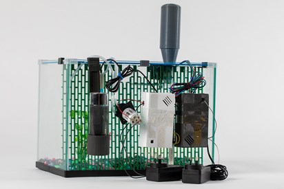 Rear view of Home Aquarium with Automatic Aquariam Maintenance Device