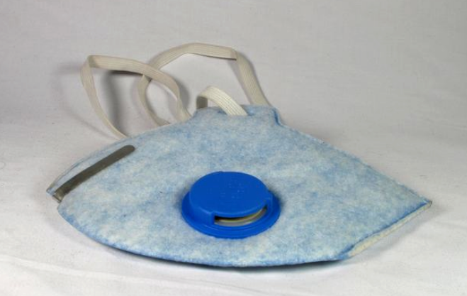 Pale blue, flat folded face mask with blue valved respirator. Elastic loop to secure to face.