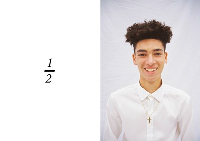 A portrait of a young man smiling, next to an image of a 'half' (1/2) fraction