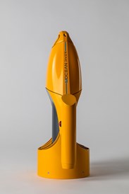 A side view of a metal yellow hand-held propulsion device standing facing upwards A side handle is in view and the writing 'Mocean diver' is written on the side. 