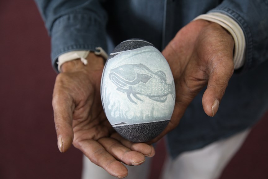 Eric Brown's carved emu egg titled Catching a Feed