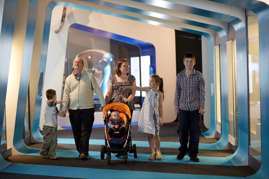 Family at the Think Ahead exhibition entrance