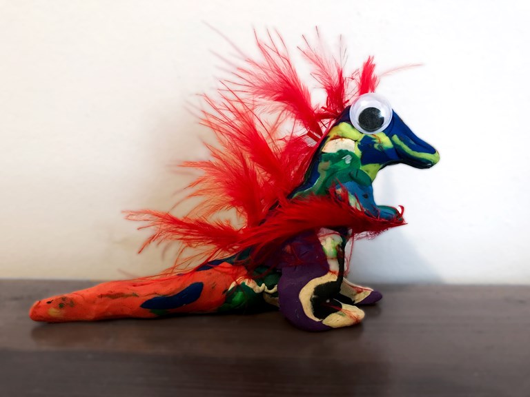 Feather dinosaur made from play-dough