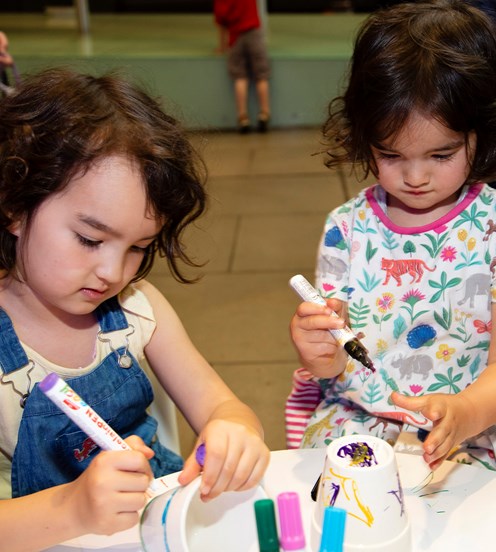Children participating in the Biostime - Early Learners Space activity at 'Romp and Stomp' 2019, Melbourne Museum.