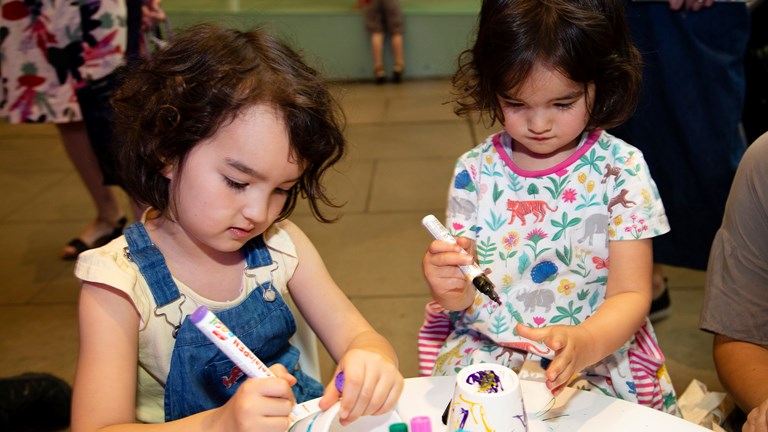 Children participating in the Biostime - Early Learners Space activity at 'Romp and Stomp' 2019, Melbourne Museum.
