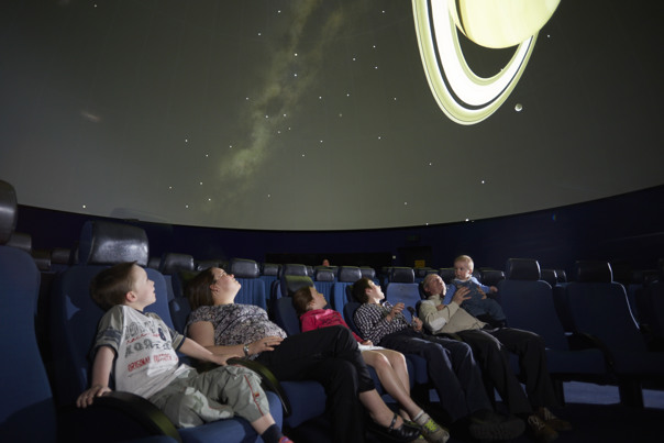 Audience in the Melbourne Planetarium looking up