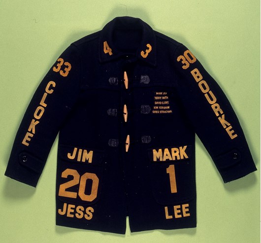 A customised duffle jacket with yellow players' names.