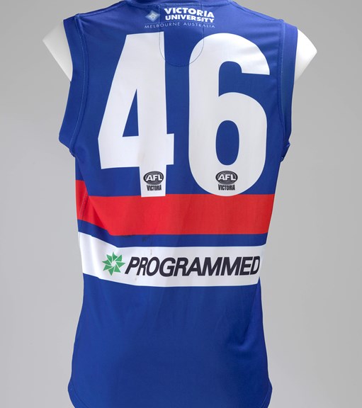 A red, blue and white Aussie rules guernsey. 