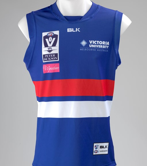 A red, blue and white Aussie rules guernsey.
