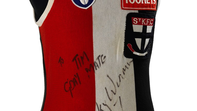 A black, red and white footy guernsey. 