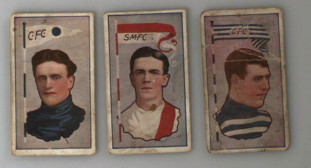 Three cards of football players. 