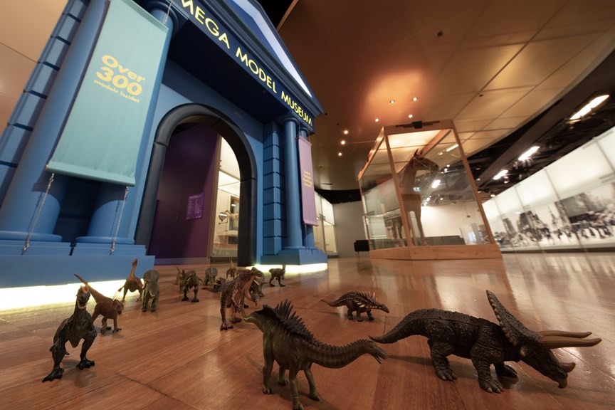 Plastic dinosaurs at the entrance of the Mini Mega Model Museum entrance