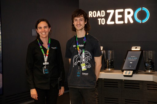 Staff at the entrance to the Road To Zero experience space