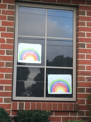 Rainbow drawings in the window