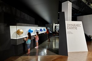 Visitors engaged with the stages of planet earth globes