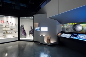 Showcases in Dynamic Earth exhibition, featuring amethyst, greenstone, beryl, and the moon. 