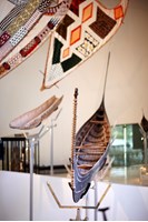 Two canoes within Te Pasifika Gallery 