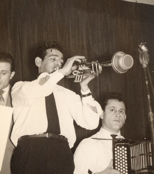 A trumpet player alongside Ugo Ceresoli and his accordion, performing with the Mokambo Orchestra, Carlton, 1950s
