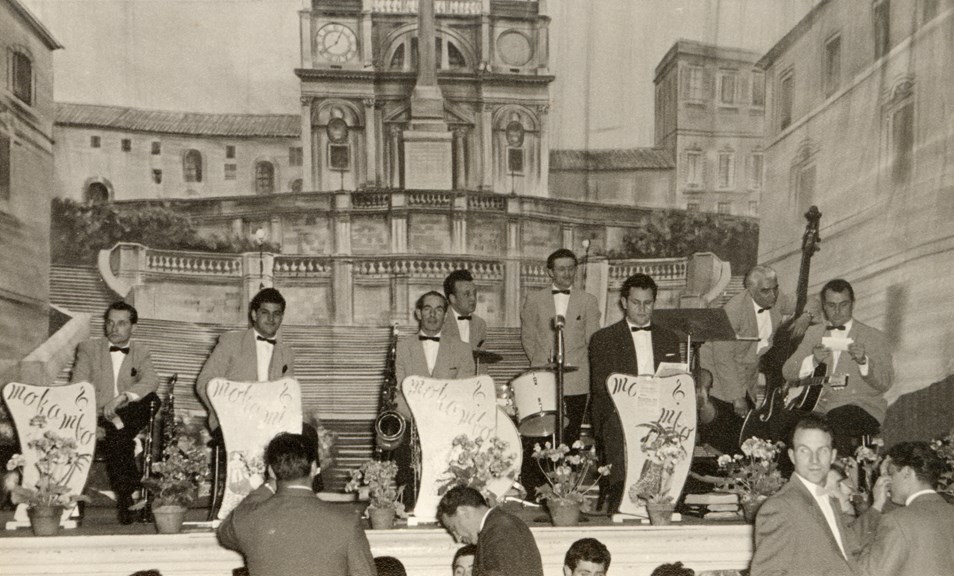 Mokambo Orchestra performing at the Fitzroy Town Hall, with a Spanish steps backdrop, 1960s