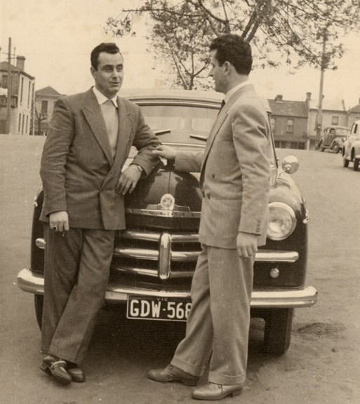 Bruno Ceresoli and his brother Ugo Ceresoli pictured alongside Ugo's Vauxhall Velox automobile in Palmerston Street, Carlton, where they rented accommodation