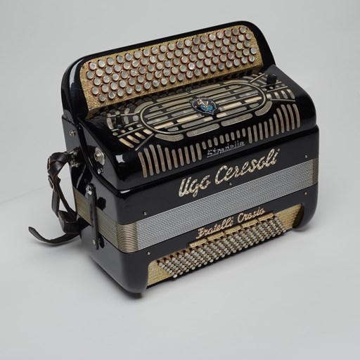 Button accordion belonging to Ugo Ceresoli, post-1950. The accordion was manufactured by Fratelli Crosio, Stradella, Lombardy, Italy.