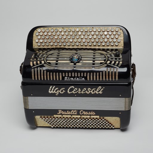 Button accordion belonging to Ugo Ceresoli, post-1950. The accordion was manufactured by Fratelli Crosio, Stradella, Lombardy, Italy.