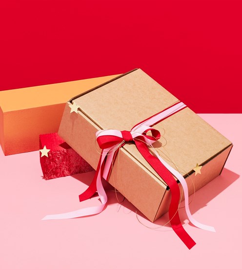 Gifts on the pink and red background
