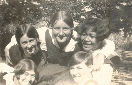 Black and white image of a group of school girls