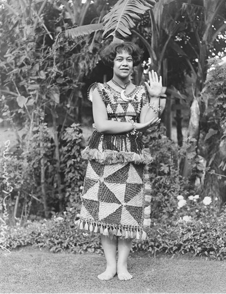 Black and white image of a woman wearing a costume