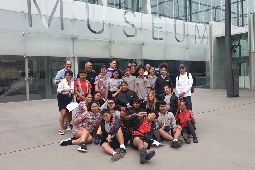 Group of school students in front of the museum