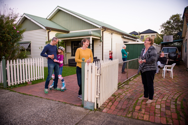 Neighbours interacting across their fence