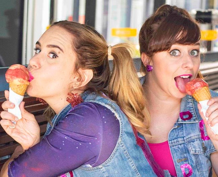 Two women eating ice creams