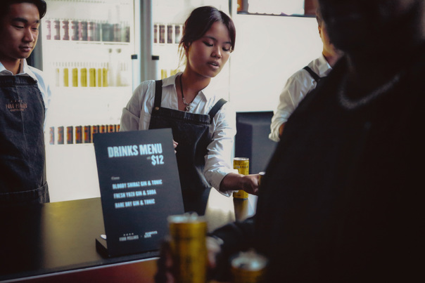 Bar staff serving drinks at the November 2023 Nocturnal.