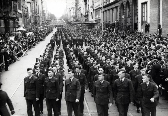 Men in uniform march through Melbourne
