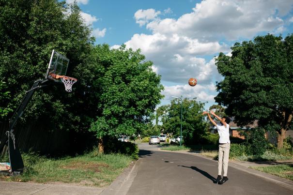 Boy throwing a basketball