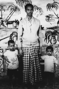 Man with two children