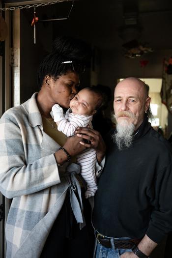 Woman, baby and man