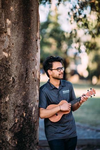 Man playing a ukelele