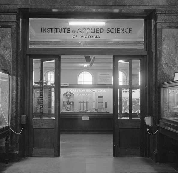 a black and white photo of the entrance of a building that reads Institute of Applied Science of Victoria