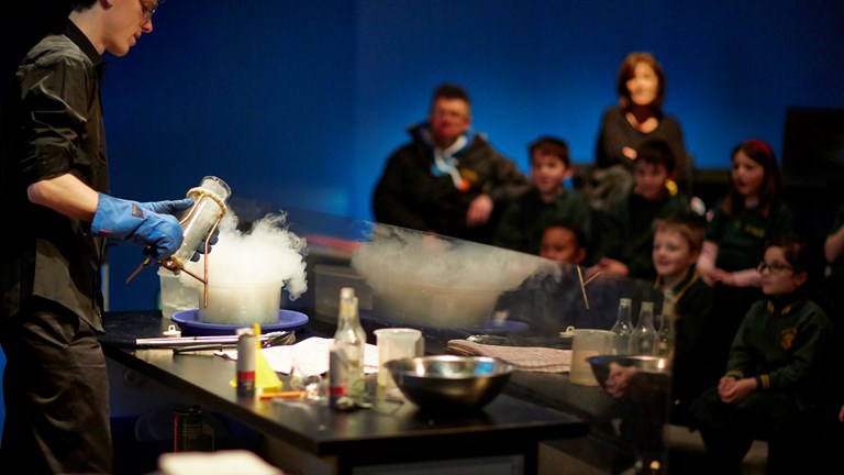 Man using dry ice for experiment