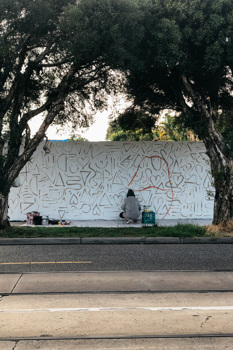 Fence paint white with small brown motifs