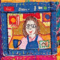 Embroidered quilt detail representing a Zoom meeting