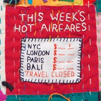Detail of embroidered quilt with a sign "This weeks hot airfares"