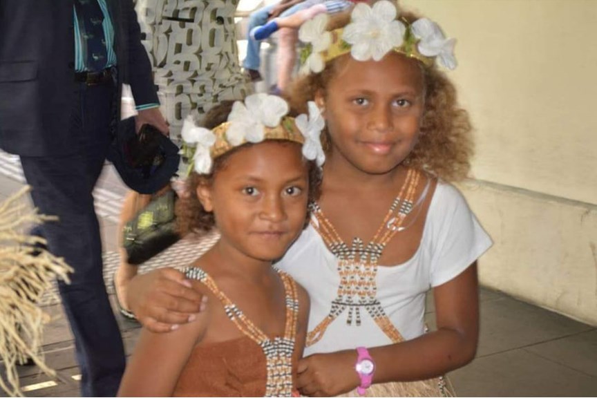 Two girls wearing tradition dress from Solomon Islands