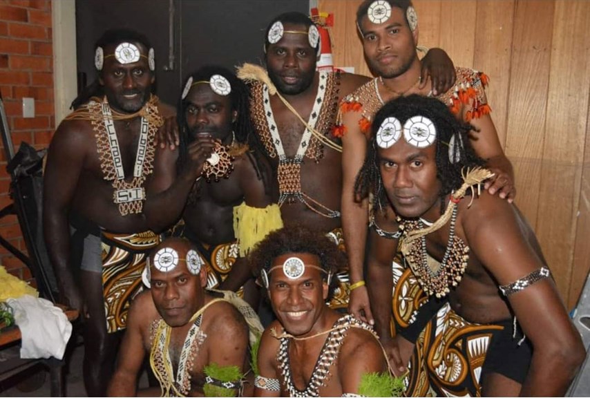 Group of male dancers posing for a photograph